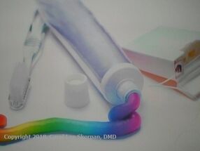 image of toothbrush, toothpaste & floss-box